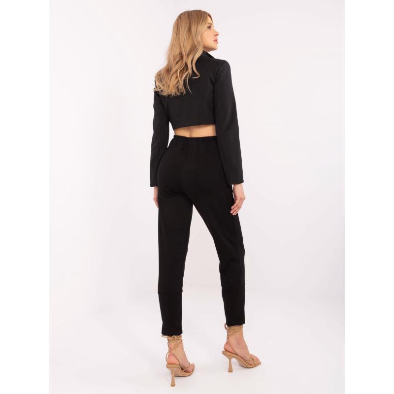 Černé tepláky se záhyby