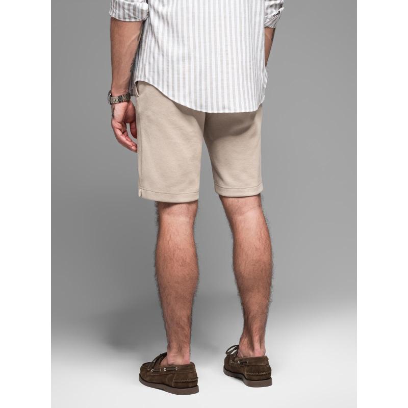 Pánske bavlnené tepláky BASIC - tmavomodré V1 OM-SRBS-0149