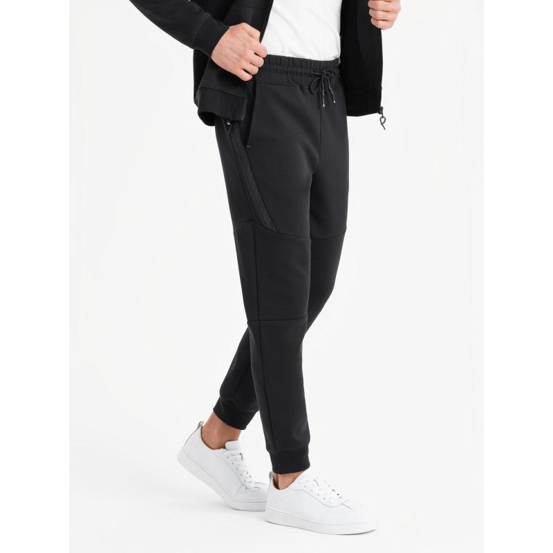 Pánské tepláky s žebrovanými manžetami a ozdobným zipem - černé V3 OM-PASK-0226