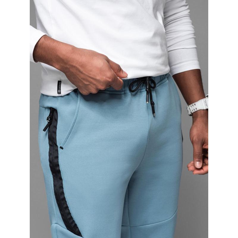 Férfi melegítőnadrág bordás szegéllyel és díszes cipzárral - világoskék V4 OM-PASK-0226