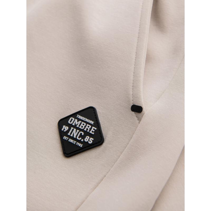 Pánské tepláky s žebrovanými manžetami a ozdobným zipem - pískové V6 OM-PASK-0226