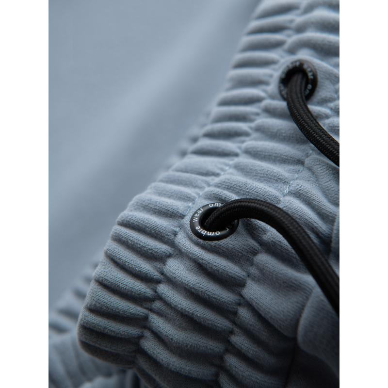 Pánské přiléhavé krátké potištěné kraťasy - světle modré V1 OM-SRSK-0138