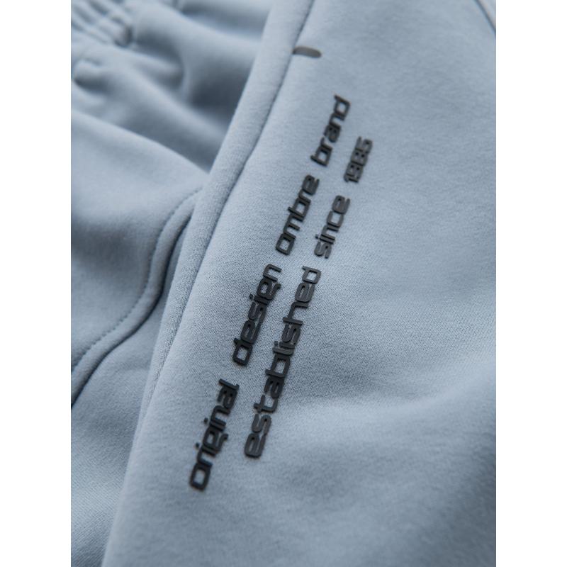 Pánské přiléhavé krátké potištěné kraťasy - světle modré V1 OM-SRSK-0138