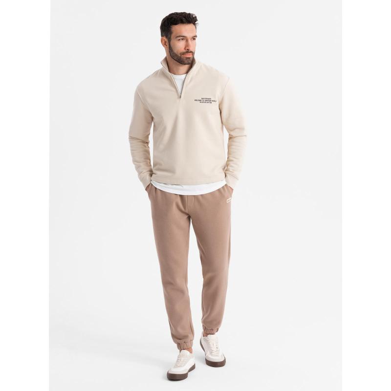 Pánské strukturované úpletové tepláky - hnědé V5 OM-PASK-0211