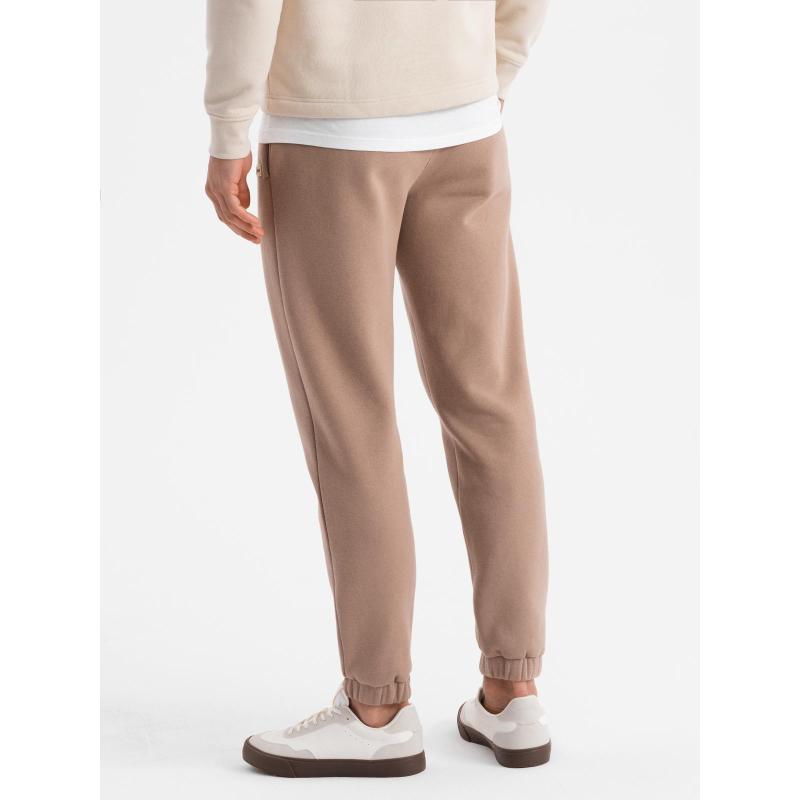 Pánské strukturované úpletové tepláky - hnědé V5 OM-PASK-0211