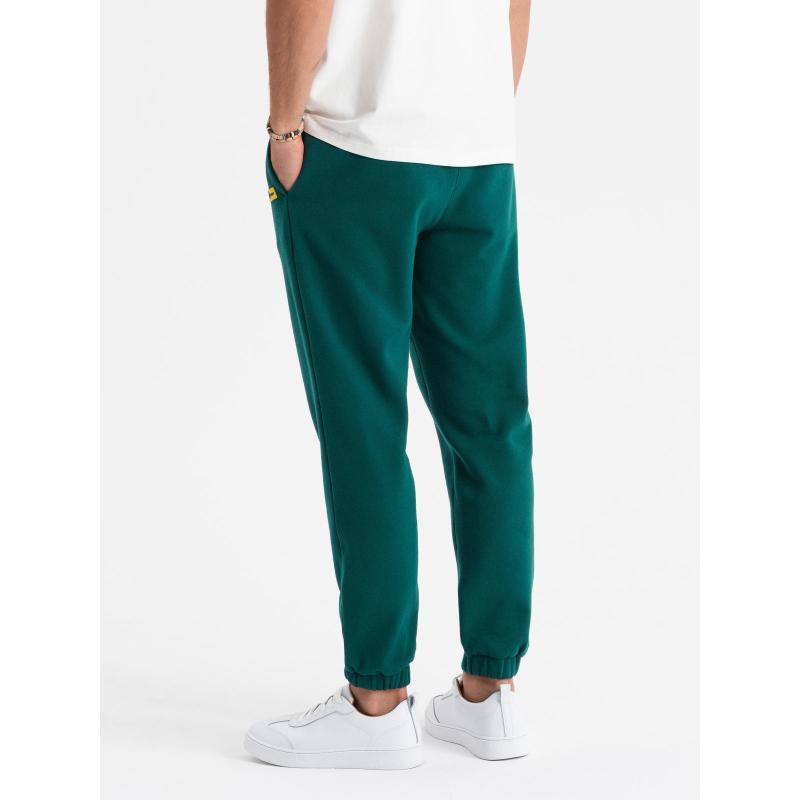 Pánske štruktúrované úpletové tepláky - zelené V5 OM-PASK-0211