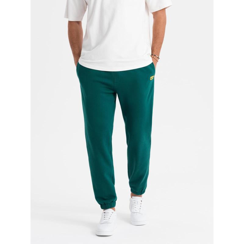 Pánske štruktúrované úpletové tepláky - zelené V5 OM-PASK-0211