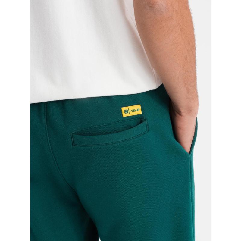 Pánske štruktúrované úpletové tepláky - zelené V5 OM-PASK-0211