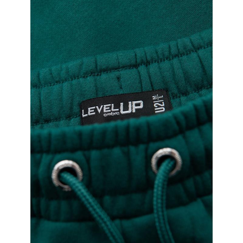 Pánske štruktúrované úpletové tepláky - zelené V5 OM-PASK-0211