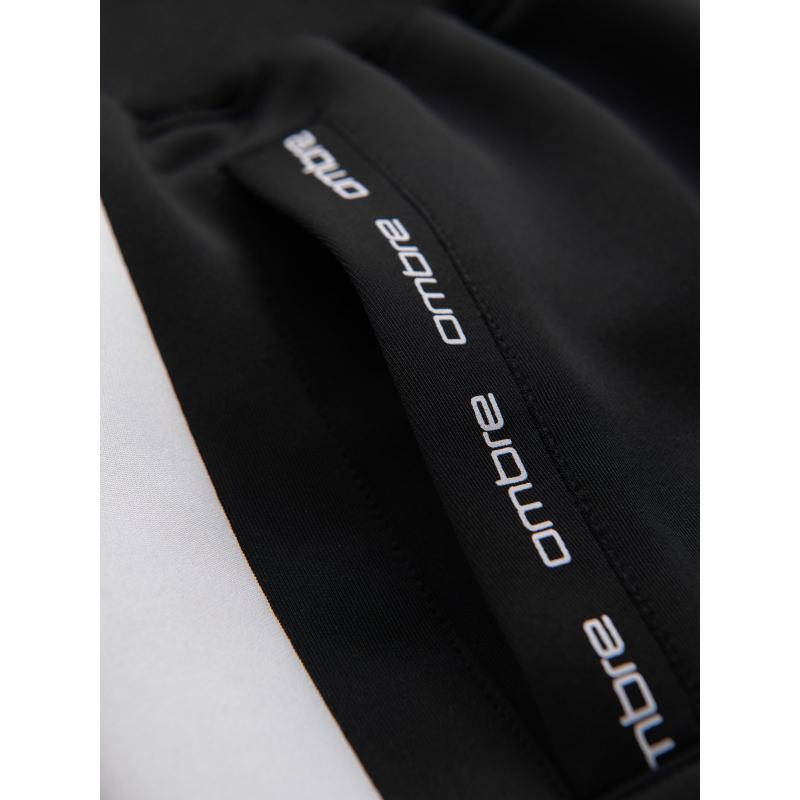 Férfi melegítő nadrág bordás mandzsettával és díszítő cipzárral - homok V6 OM-PASK-0226