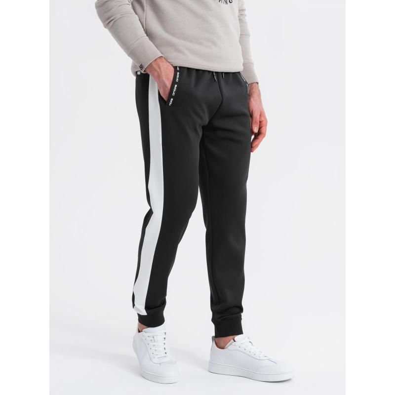 Férfi melegítő nadrág bordás mandzsettával és díszítő cipzárral - homok V6 OM-PASK-0226