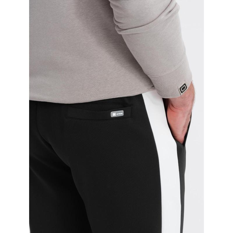 Férfi melegítő nadrág bordás mandzsettával és díszítő cipzárral - homok V6 OM-PASK-0226