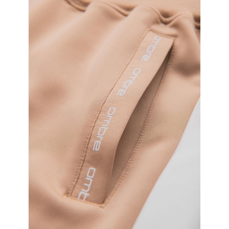 Férfi melegítőnadrág bordás szegélyű és díszes cipzárral - homok V6 OM-PASK-0226