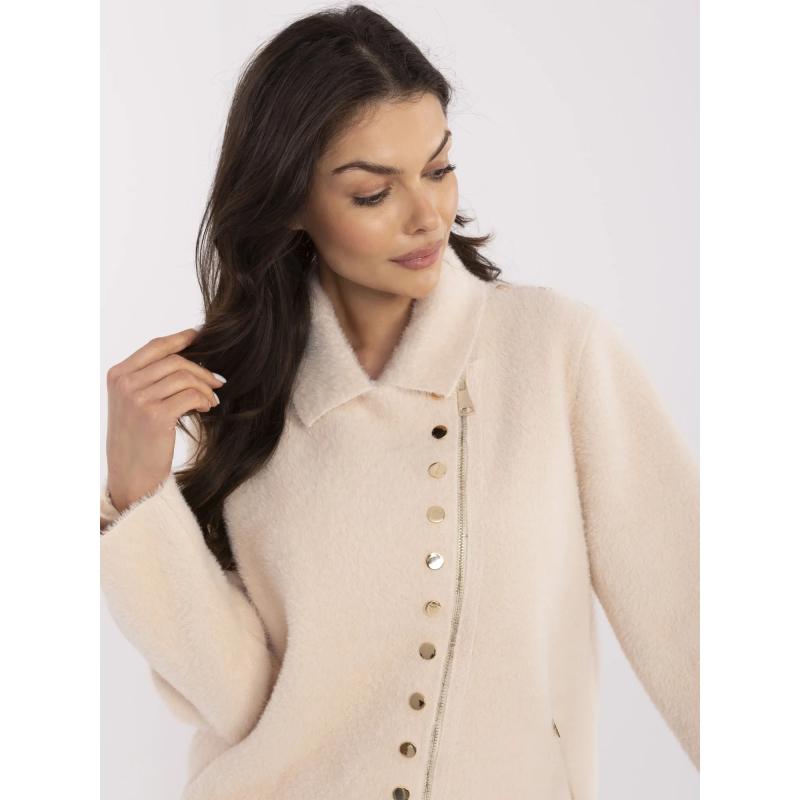 Világos bézs alpaka kabát díszes patentokkal