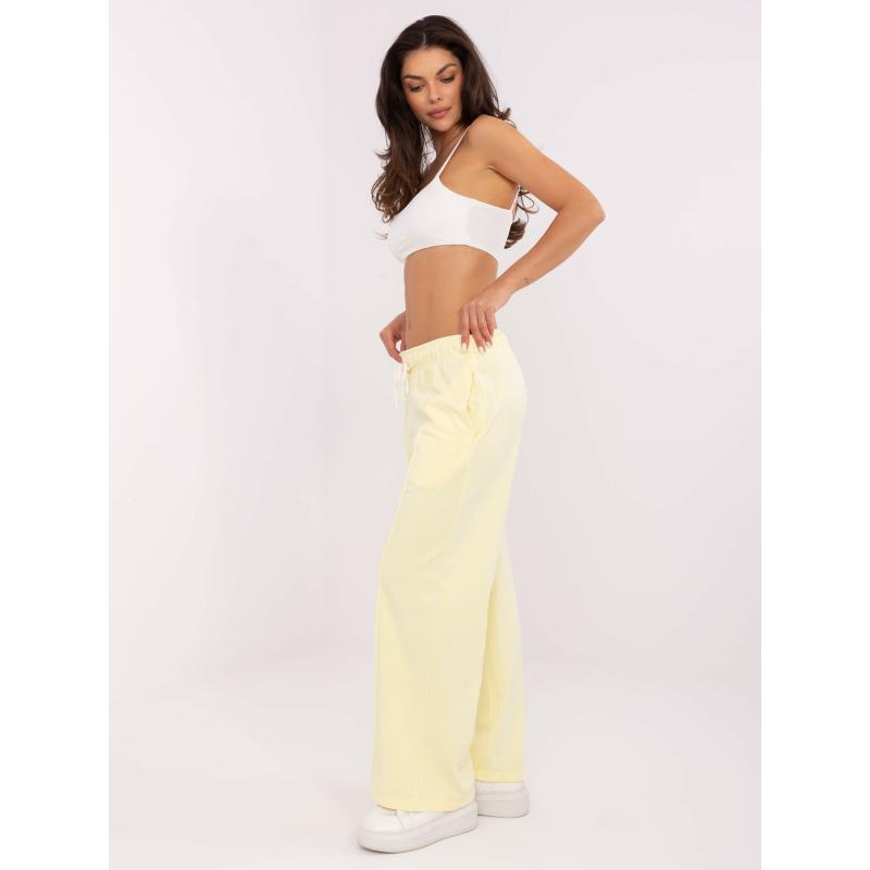 Světle žluté basic teplákové kalhoty se zavazováním