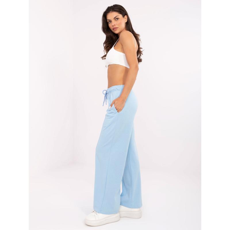 Světle modré tepláky s kapsami
