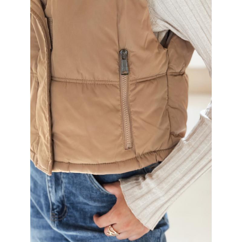 Női steppelt mellény sötét bézs