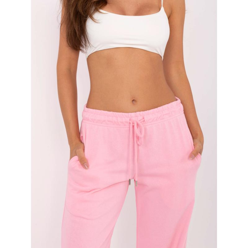 Világos rózsaszín alap melegítő nadrág