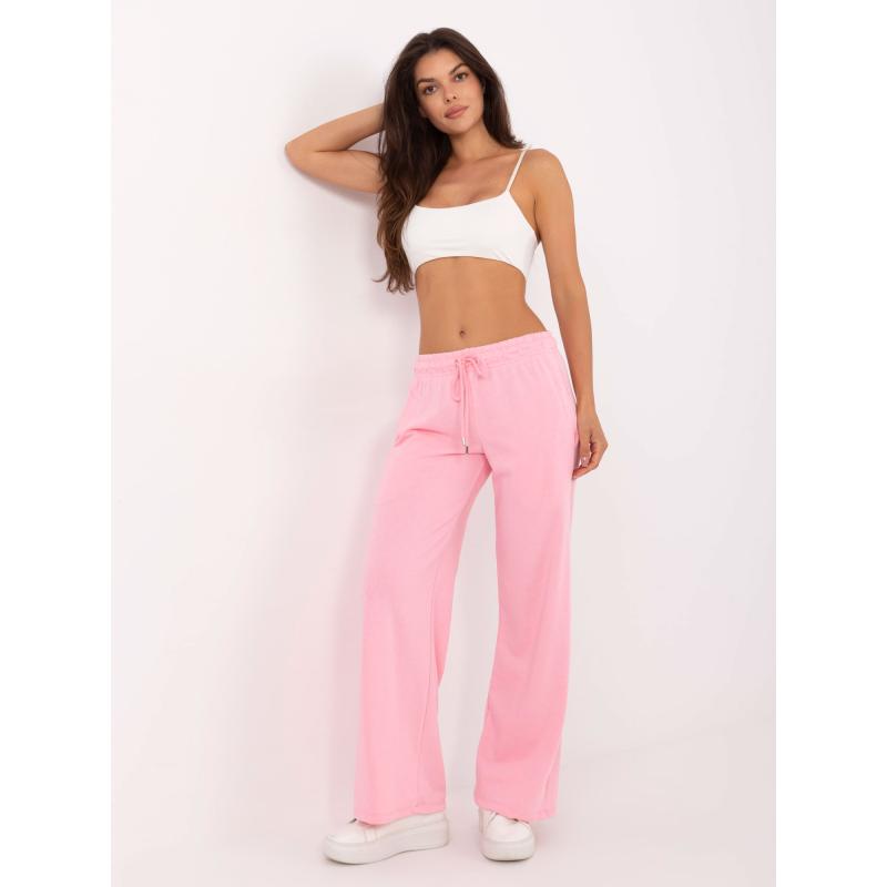 Világos rózsaszín alap melegítő nadrág