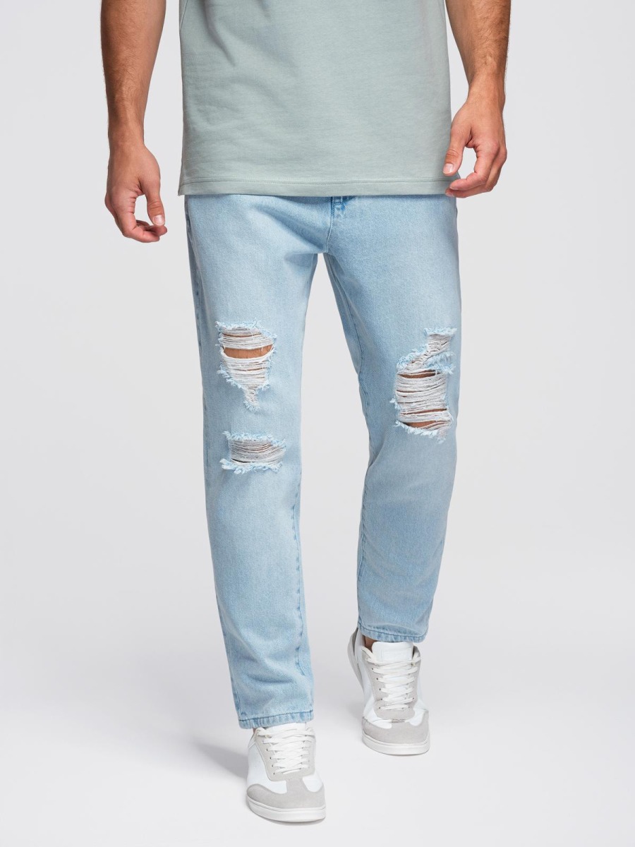 Pánské carrot fit džínové jogger kalhoty s potrhanými detaily, světle modré