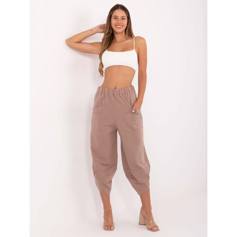 Tmavobežové tepláky bez zapínania