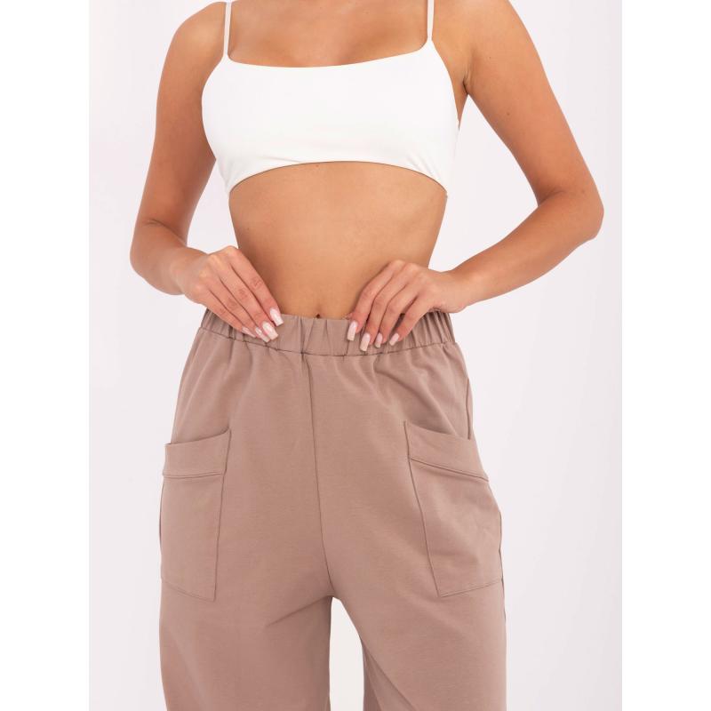 Tmavobežové tepláky bez zapínania