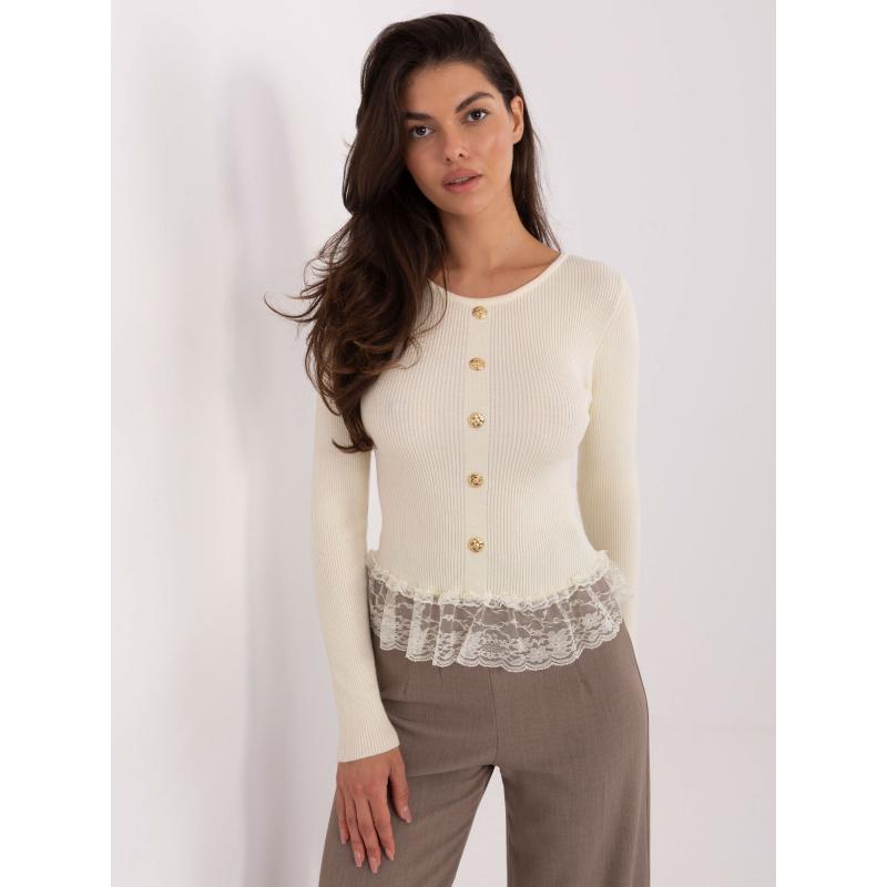 Vajas női pulóver volánokkal az alsó szegélyén