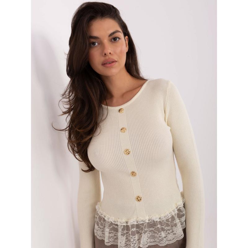 Vajas női pulóver volánokkal az alsó szegélyén