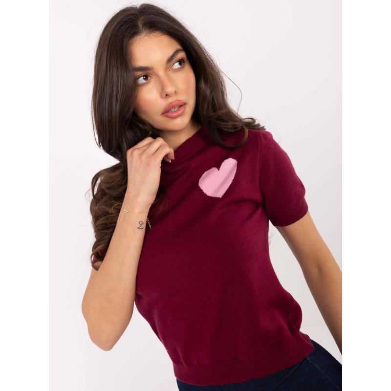 Fluoreszkáló rózsaszín kötött ruha copfokkal