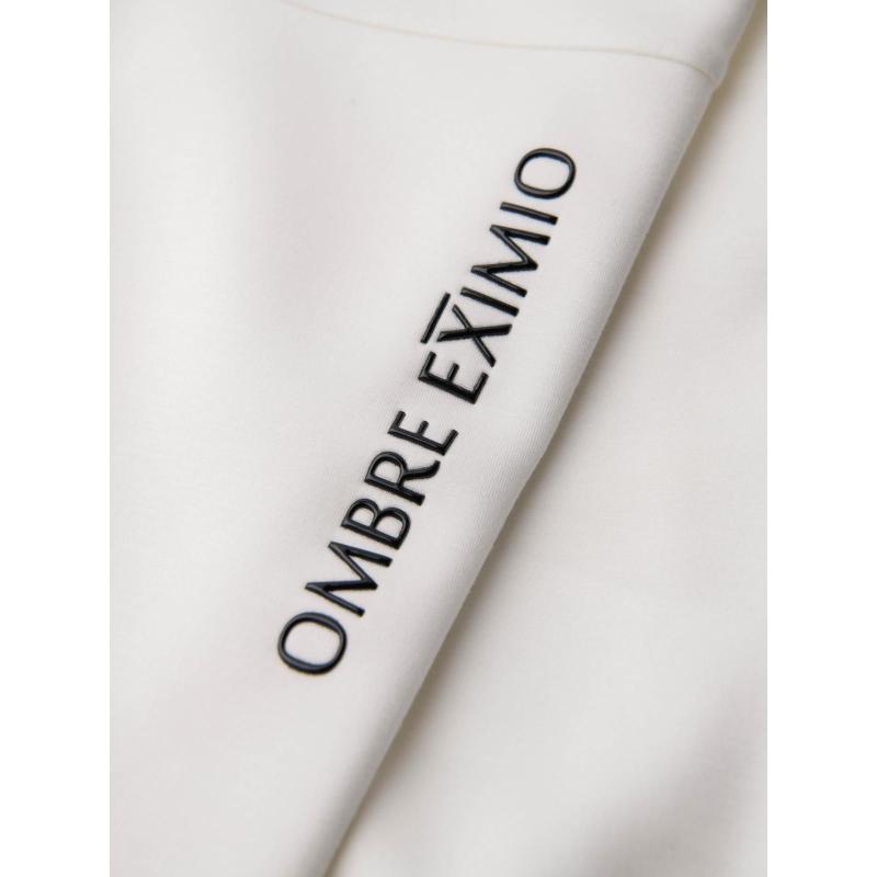 Pánské tepláky s žebrovanými nohavicemi a gumovým potiskem – bílé V2 OM-PASK-0223