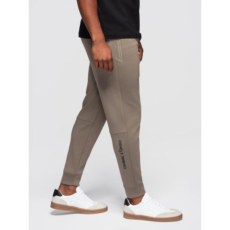 Férfi melegítőnadrág bordás szárral és gumibélyegzéssel – hamuszürke V3 OM-PASK-0223