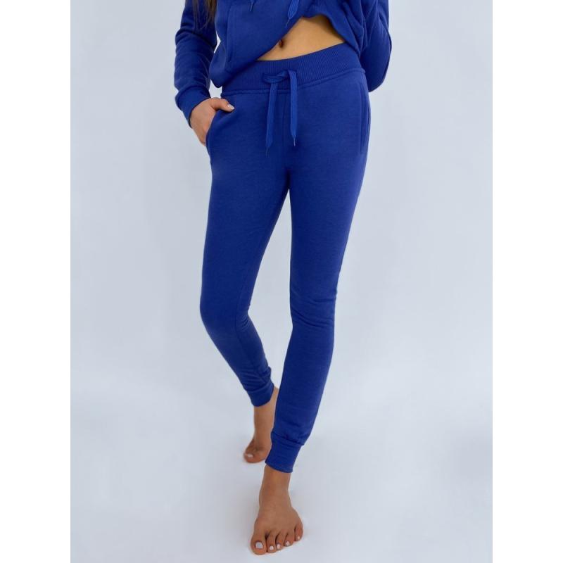 Dámske športové tepláky FITS tmavo modrá