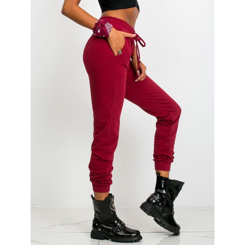 Dámske tepláky FASTER tmavočervené