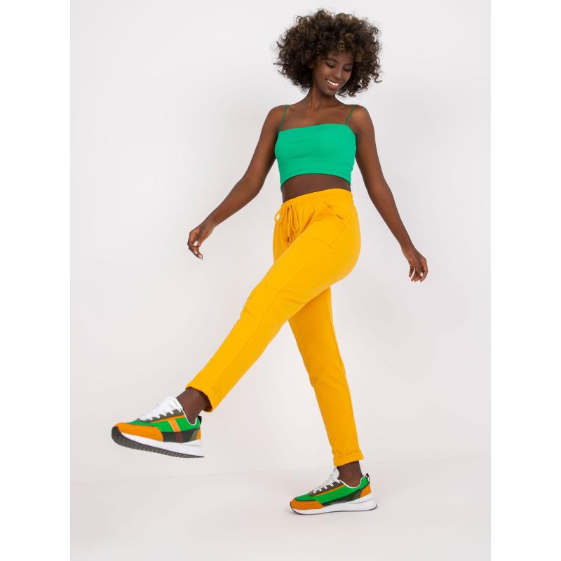 Dámské tepláky s kapsami MINA světle oranžové 