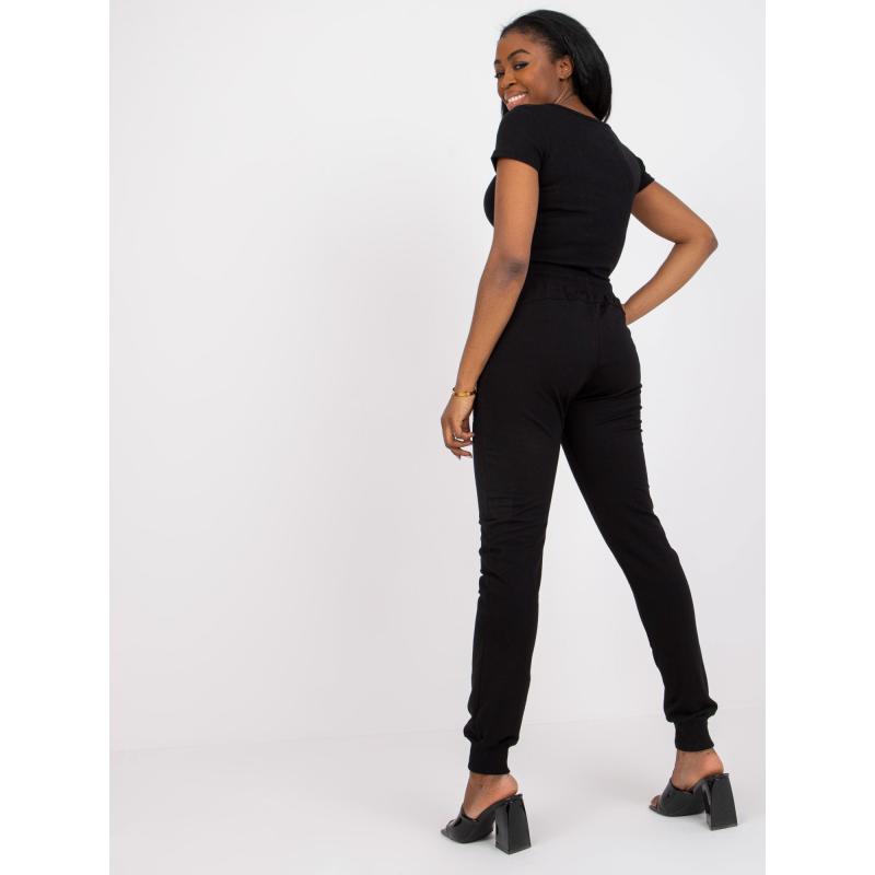 Dámské tepláky slim fit střihu s kamínky STONY černá