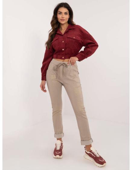 Béžové nohavice z lesklej látky s vreckami