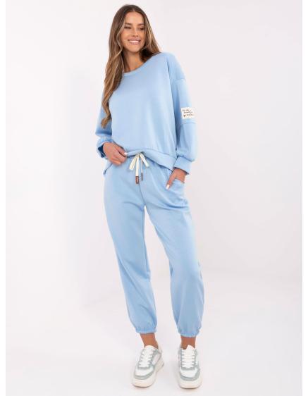 Světle modrá tepláková souprava se spodním dílem joggerů