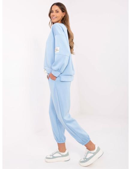 Světle modrá tepláková souprava se spodním dílem joggerů