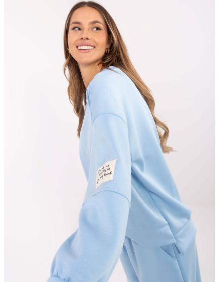 Světle modrá tepláková souprava se spodním dílem joggerů