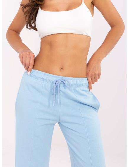 Světle modré tepláky s kapsami