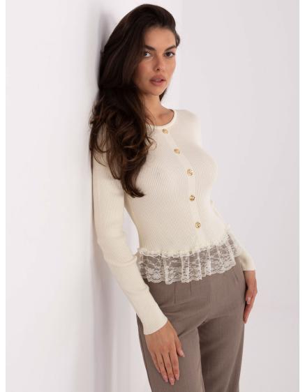 Vajas női pulóver volánokkal az alsó szegélyén