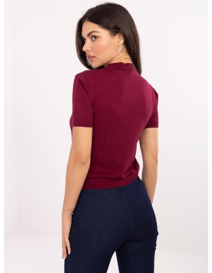 Fluoreszkáló rózsaszín kötött ruha copfokkal