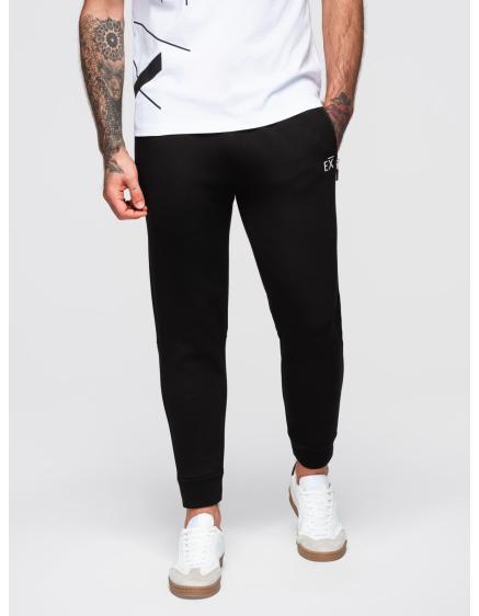 Pánské tepláky s žebrovanými nohavicemi a gumovým potiskem – černé V1 OM-PASK-0223