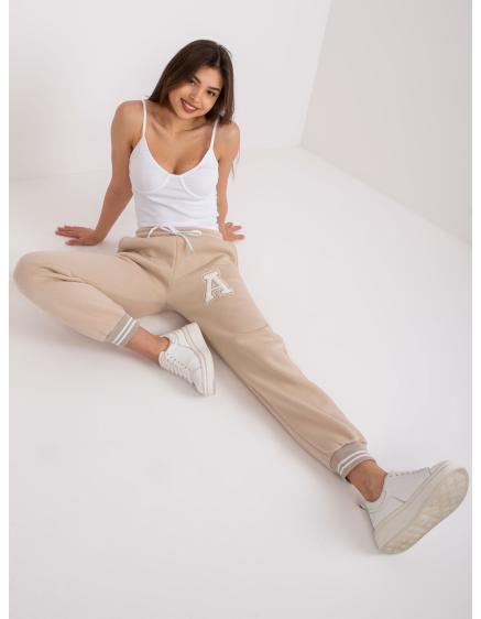Női melegítőnadrág zsebekkel DARINA bézs színű