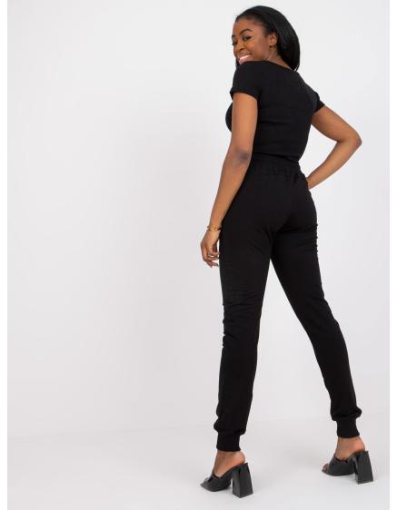 Dámské tepláky slim fit střihu s kamínky STONY černá